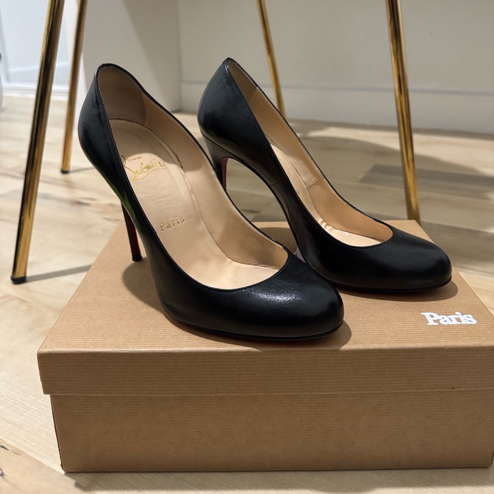 Christian Louboutin Elegant Black Heels with Signature Red Soles
